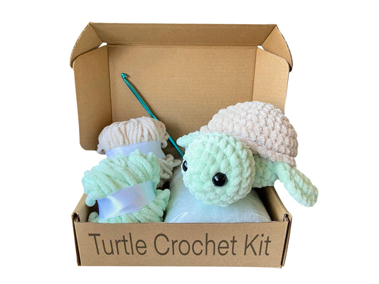 Handmade turtle toy made with green and brown chenille yarn, part of a DIY crochet kit by SimplyCraftsBySam