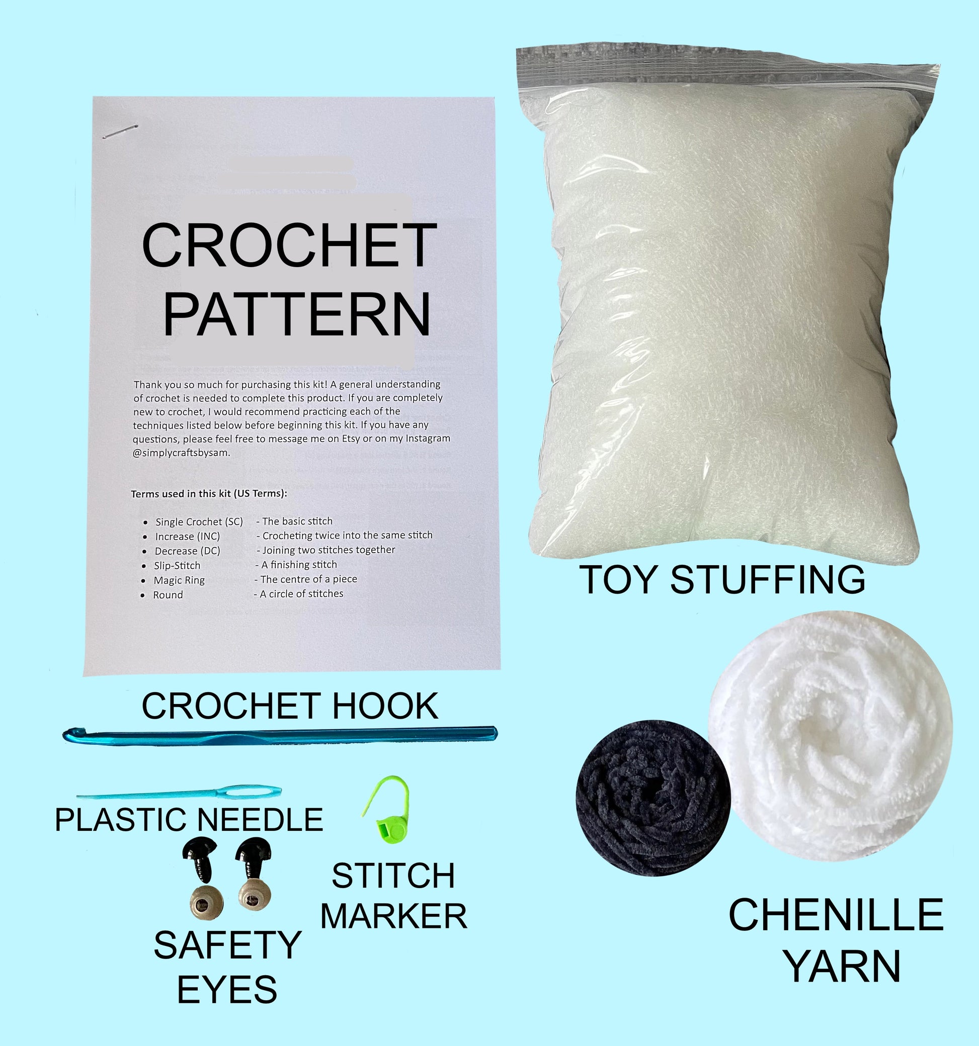 Contents of the seal crochet kit including a written crochet pattern, crochet hook, plastic needle, safety eyes, stitch marker, toy stuffing and chenille yarn